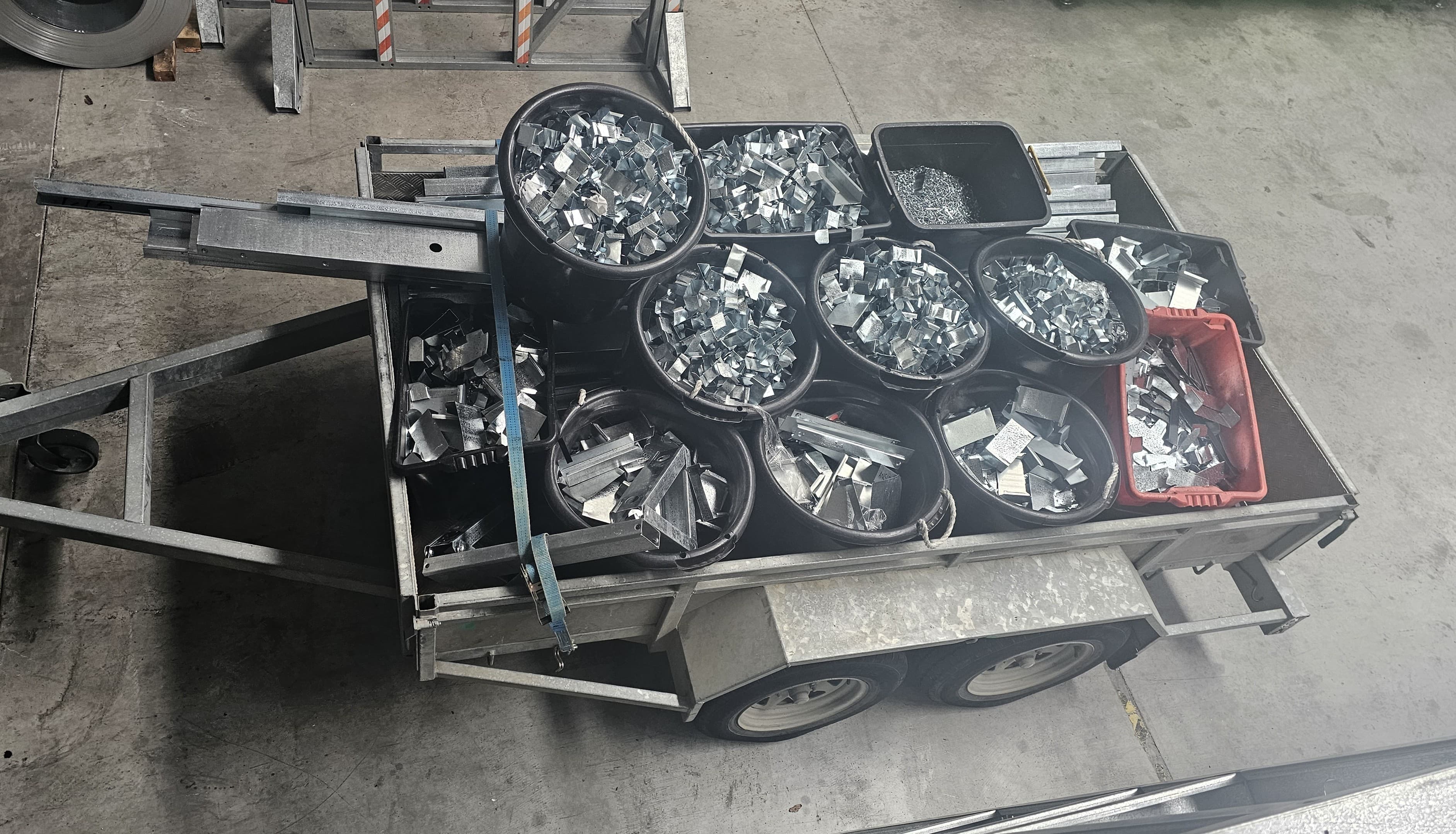 Sorted steel offcuts in bins, ready for recycling