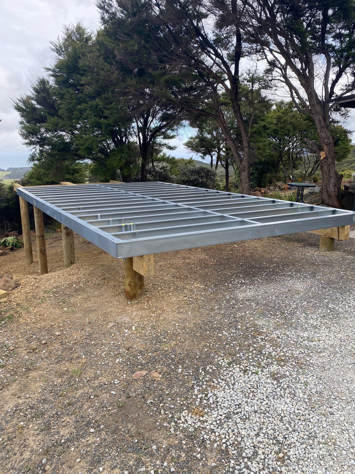 150mm steel floor panel system raised on piles at a SmartFraming build site
